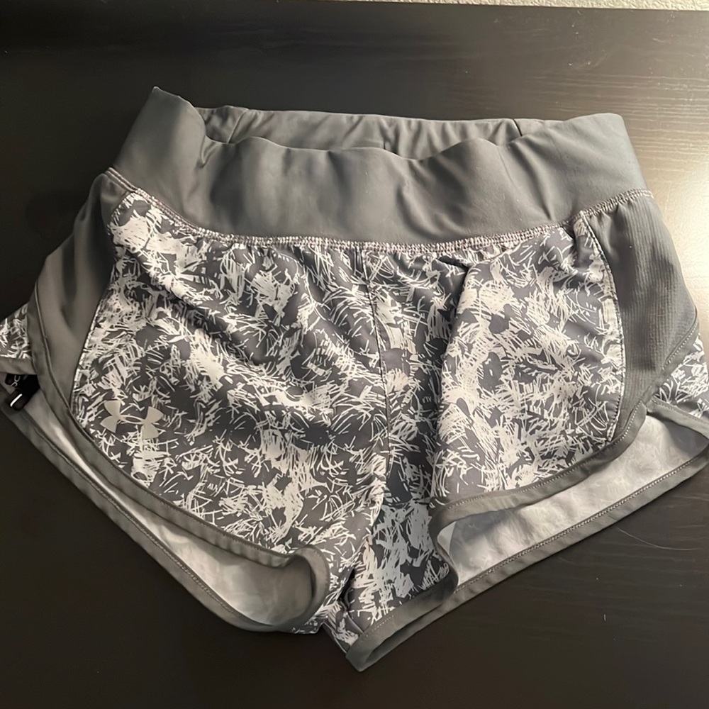 Grey and white under armour athletic shorts
